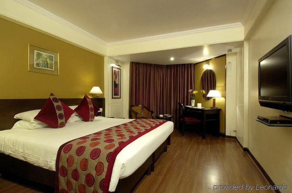 Ramee Guestline Hotel Juhu Mumbai Rum bild